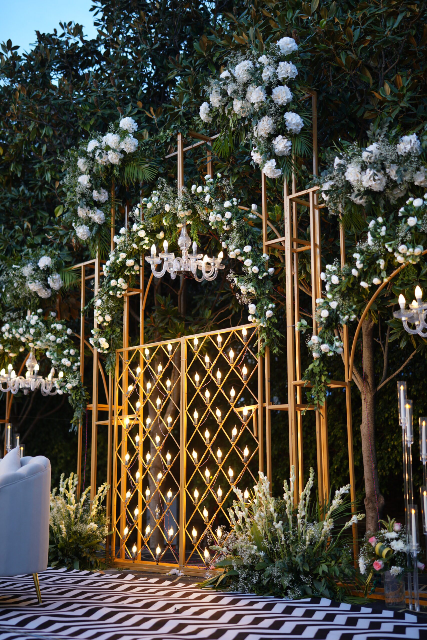 Close-up of a premium white chrysanthemum and blue orchid floral centerpiece